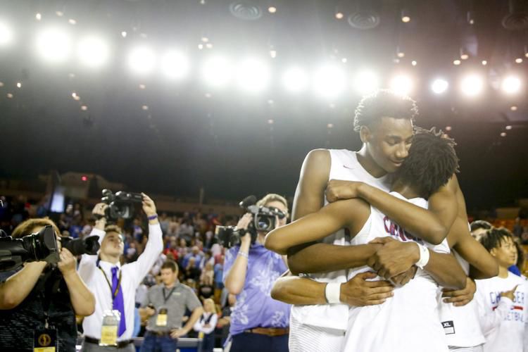 Memorial boys basketball takes state once again